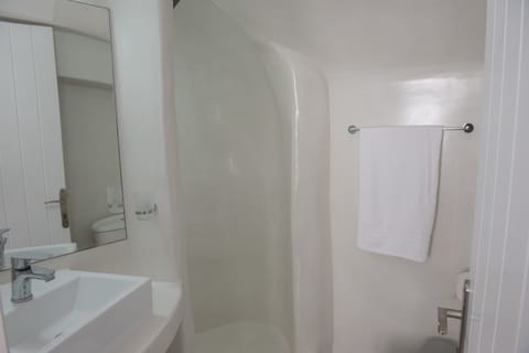 Apartment, 2 Bedrooms (Without View) | Bathroom | Shower, rainfall showerhead, slippers, towels