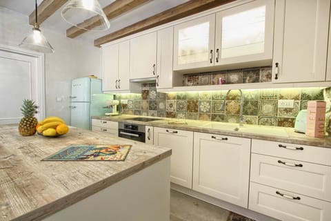 Villa | Private kitchen | Fridge, microwave, oven, stovetop