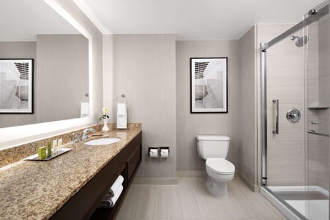 Designer toiletries, hair dryer, towels, soap