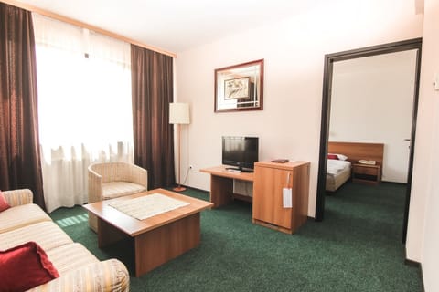 Standard Suite, 1 Queen Bed, Non Smoking, City View | 2 bedrooms, desk, free WiFi, bed sheets