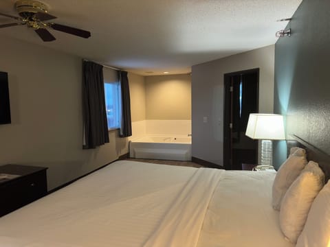 Premium bedding, desk, blackout drapes, soundproofing