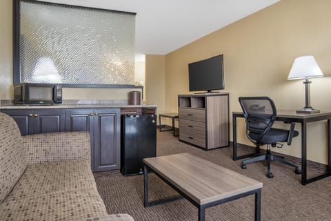Suite, 1 King Bed, Non Smoking, Refrigerator & Microwave (with Sofabed) | Desk, laptop workspace, iron/ironing board, free cribs/infant beds
