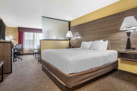 Suite, 1 King Bed, Non Smoking, Refrigerator & Microwave (with Sofabed) | Desk, laptop workspace, iron/ironing board, free cribs/infant beds