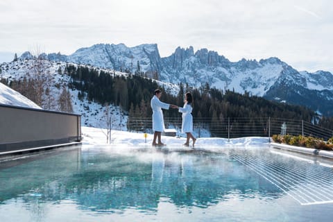 Indoor pool, outdoor pool, open 10:00 AM to 7:30 PM, pool umbrellas