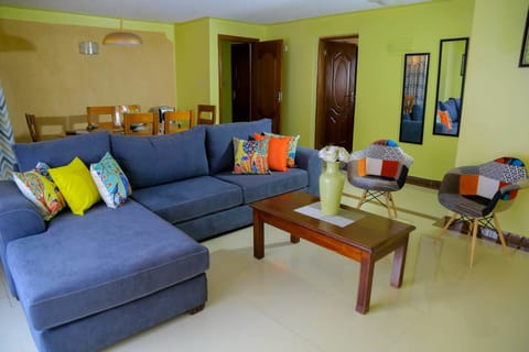 Comfort Triple Room, 3 Bedrooms | Living area | Flat-screen TV