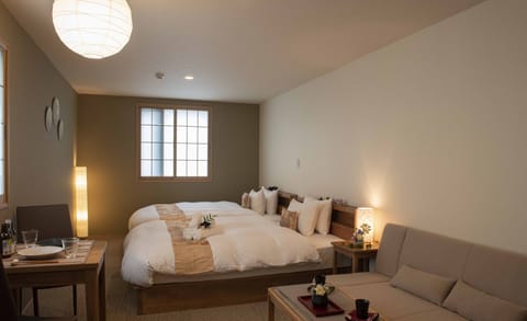 Desk, laptop workspace, free WiFi, bed sheets