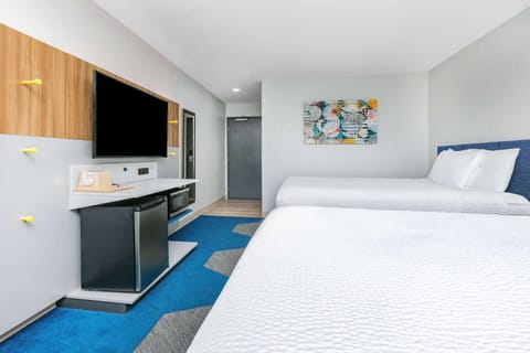 In-room safe, desk, iron/ironing board, free cribs/infant beds