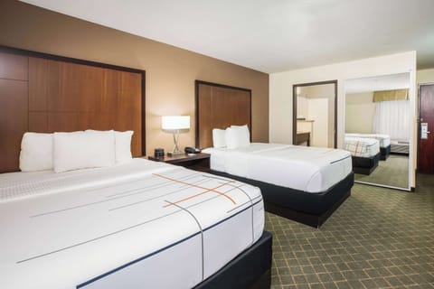 Pillowtop beds, desk, blackout drapes, iron/ironing board