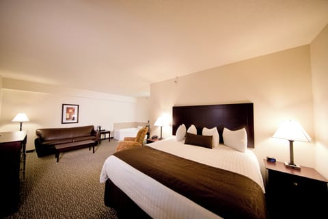 Suite, Multiple Beds, Non Smoking, Jetted Tub | Premium bedding, pillowtop beds, desk, laptop workspace