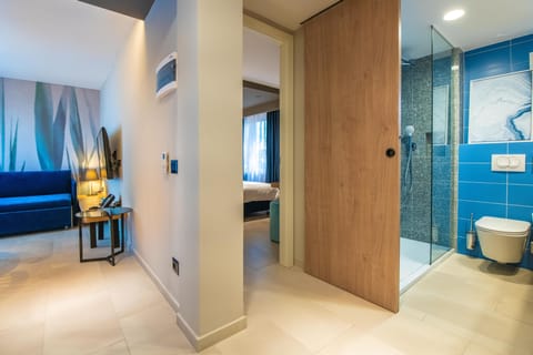 One bedroom apartment, balcony, sea view | In-room safe, desk, blackout drapes, free cribs/infant beds