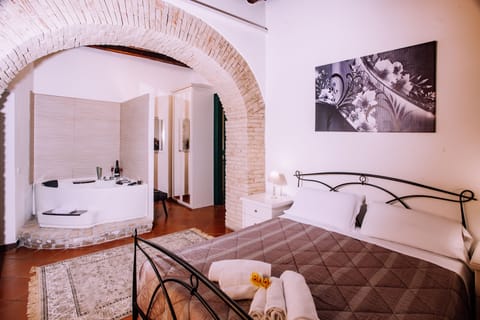 Deluxe Apartment, 1 Bedroom, City View | 1 bedroom, in-room safe, soundproofing, iron/ironing board