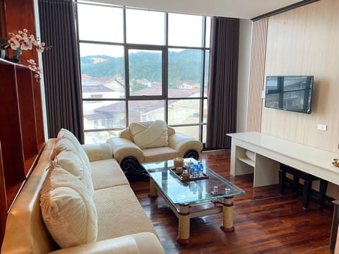Junior Double Room | Living area | LCD TV