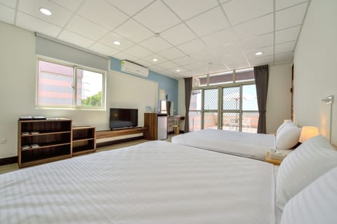 Standard Quadruple Room, 2 Queen Beds, Non Smoking | Blackout drapes, free WiFi, bed sheets