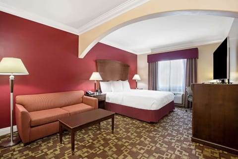 Suite, 1 King Bed, Non Smoking | Premium bedding, desk, iron/ironing board, free WiFi