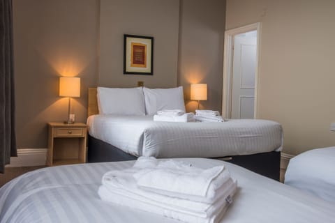 Family Room | Desk, iron/ironing board, free WiFi, bed sheets