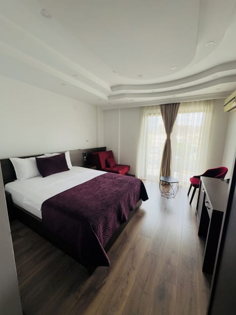 Minibar, desk, laptop workspace, blackout drapes