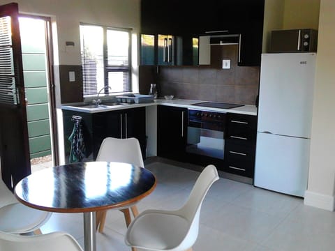 Deluxe Apartment, 1 Bedroom, Non Smoking | Private kitchen | Fridge, coffee/tea maker, electric kettle