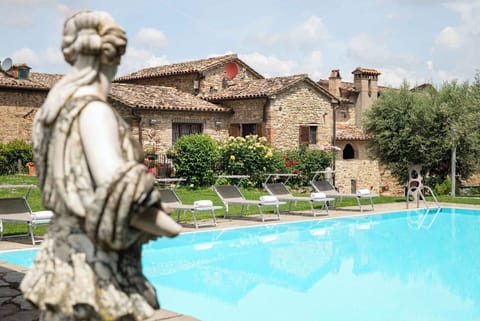 Seasonal outdoor pool, open 9:30 AM to 8:00 PM, sun loungers