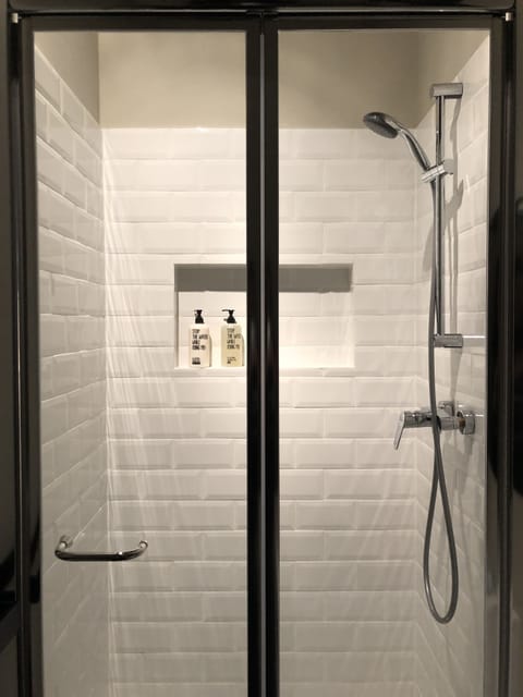 Shower, hair dryer, bathrobes, towels