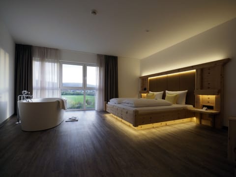 Deluxe Double Room | In-room safe, desk, blackout drapes, iron/ironing board