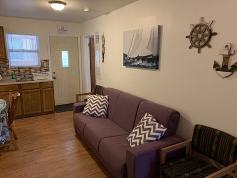 Deluxe Cabin, Multiple Beds, Non Smoking | Living room | Flat-screen TV