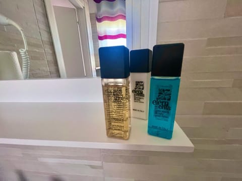 Quadruple Room, Non Smoking | Bathroom | Shower, free toiletries, hair dryer, slippers