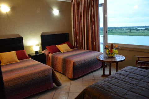 Family Room, Multiple Beds, Non Smoking, Garden View | In-room safe, individually decorated, individually furnished