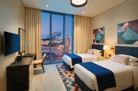 Deluxe Twin Room, 2 Twin Beds | Minibar, in-room safe, desk, soundproofing