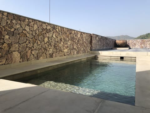 Outdoor pool, open 6:00 AM to 9:00 PM, sun loungers