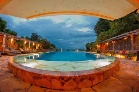 15 outdoor pools, open 8:00 AM to 10:00 PM, pool umbrellas, sun loungers