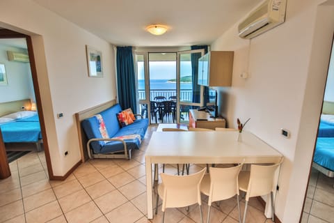Two bedroom apartment (5+2) - sea view | Living area | 43-inch LCD TV with satellite channels