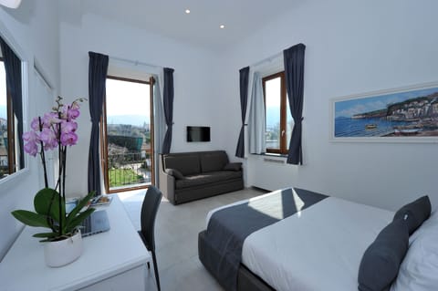 Family Quadruple Room, 1 Bedroom, Ensuite, Courtyard View | Premium bedding, down comforters, minibar, individually furnished