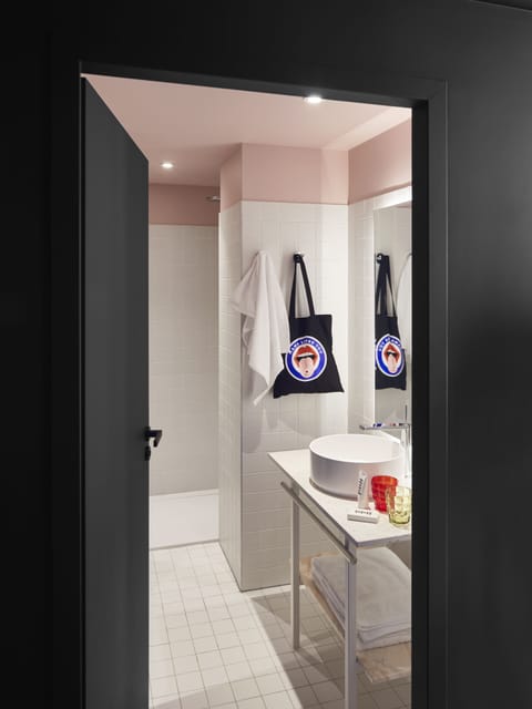 Shower, eco-friendly toiletries, hair dryer, towels