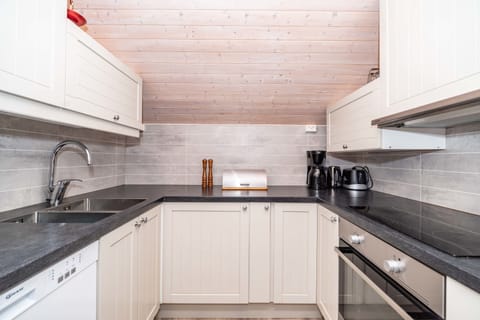 Premium Apartment, Multiple Beds, Non Smoking, Partial Sea View | Private kitchen | Mini-fridge, coffee/tea maker, electric kettle