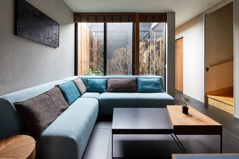 Room with Private Cypress bath | Living room | Flat-screen TV