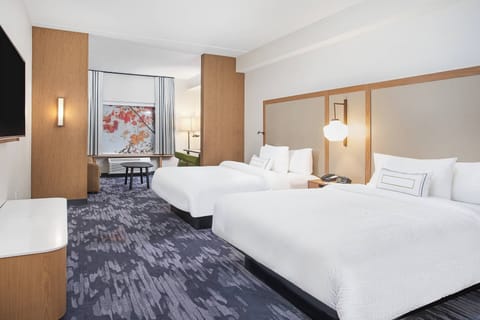 Desk, blackout drapes, iron/ironing board, cribs/infant beds