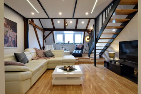 Exclusive Apartment, 2 Bedrooms | Living room | 120-cm flat-screen TV with digital channels, plasma TV