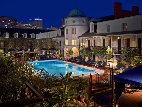 Outdoor pool, open 11:00 AM to 7:00 PM, pool umbrellas, sun loungers