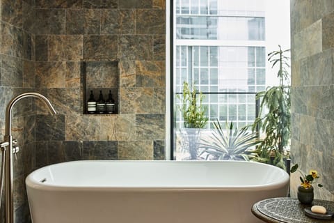 Designer toiletries, hair dryer, bathrobes, towels