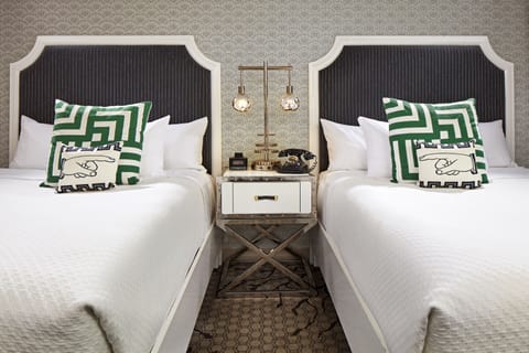 Premium bedding, down comforters, pillowtop beds, in-room safe