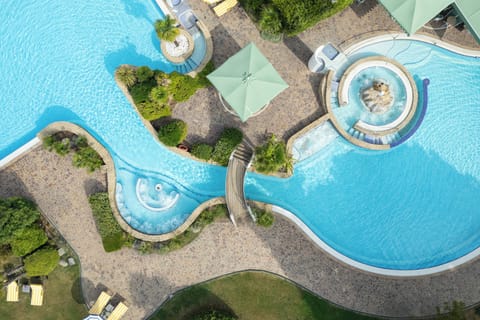 Indoor pool, outdoor pool, pool umbrellas, sun loungers