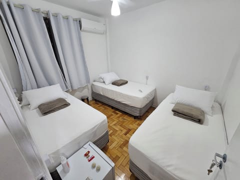 Basic Single Room | Minibar, blackout drapes, iron/ironing board, free WiFi