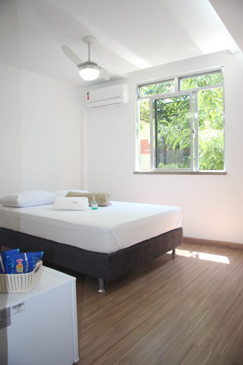Economy Double Room, Multiple Beds, Non Smoking | Minibar, blackout drapes, iron/ironing board, free WiFi