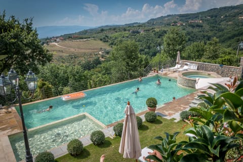 Outdoor pool, open 9:00 AM to 7:00 PM, sun loungers
