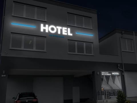 Front of property - evening/night
