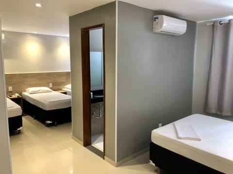 Family Room | Minibar, desk, cribs/infant beds, travel crib
