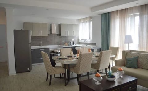 Apartment, 3 Bedrooms | Living area | Flat-screen TV