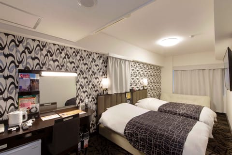 Down comforters, desk, blackout drapes, free WiFi