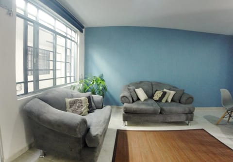 Apartment, Multiple Beds, Non Smoking | Living room | Flat-screen TV