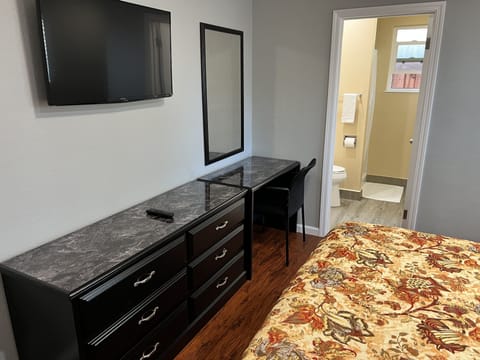 Room, 1 Queen Bed | Individually decorated, individually furnished, desk, iron/ironing board